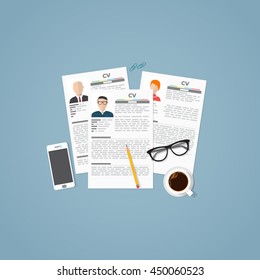 Curriculum vitae job papers with personal info and picture. Job business interview concept with candidats resume and objects.