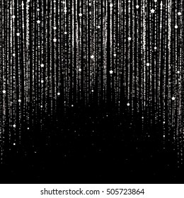 curtain of silver particles on a black background