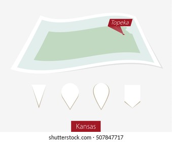 Curved paper map of Kansas state with capital Topeka on Gray Background. Four different Map pin set. Vector Illustration.