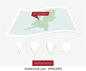 Curved paper map of Netherlands with capital Amsterdam on Gray Background. Four different Map pin set. Vector Illustration.