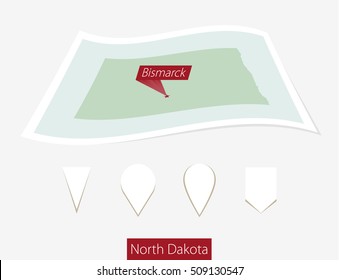 Curved paper map of North Dakota state with capital Bismarck on Gray Background. Four different Map pin set. Vector Illustration.