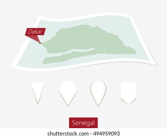 Curved paper map of Senegal with capital Dakar on Gray Background. Four different Map pin set. Vector Illustration.