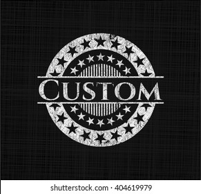 Custom chalk emblem written on a blackboard