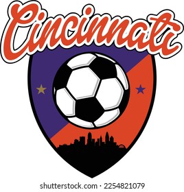 Custom illustrated soccer ball or football logo with the skyline buildings silhouette of the City Cincinnati Ohio inside a shield crest and script text up above. Vector eps graphic design.