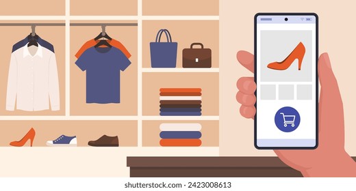 Customer in a clothing store checking products and buying items using his smartphone, AR and digital payments concept