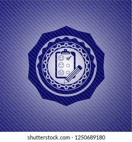 customer feedback icon inside emblem with denim texture