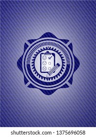 customer feedback icon inside emblem with jean texture