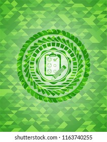 customer feedback icon inside green mosaic emblem