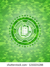customer feedback icon inside green emblem with triangle mosaic background
