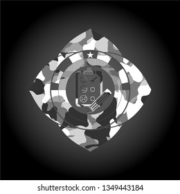 customer feedback icon inside grey camo texture