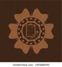 customer feedback icon inside wood emblem