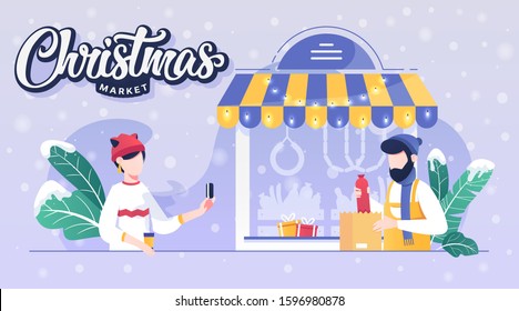 Customer making a purchase at local Christmas market. Storefront with Christmas wreath, garlands and snow isolated on white. Christmas Fair and New Year sales and special offers. Festive healthy food.