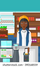 Customer paying with smartphone using terminal.