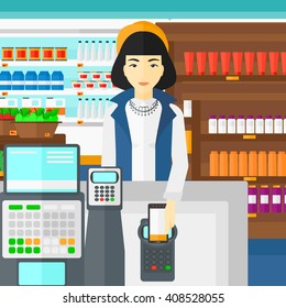 Customer paying with smartphone using terminal.