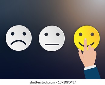 Customer service evaluation and satisfaction survey concepts. Hand of the businessman touching picked the happy face smile.