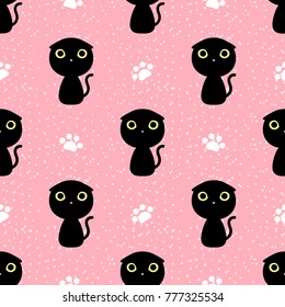 Cut black cat with paw and dot seamless pattern on pink background.