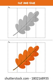 Cut and glue game for kids. Vector illustration of cute autumn leaf. Cutting practice for preschoolers. Educational worksheet for kids.