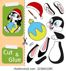 Cut and glue the paper game with rabbit in Santa hat sitting and painting brush christmas Ball. Create application cartoon Rabbit as symbol of 2023 New Year. Kids logic game and activities jigsaw.