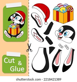 Cut and glue the paper game with rabbit in santa hat holding a full box of christmas balls and sweets. Create application cartoon Rabbit as symbol of 2023 New Year. Kids logic game, activities jigsaw.