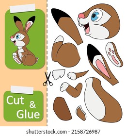Cut and glue the paper sitting Hare. Create application the cartoon Rabbit. Education riddle entertainment or amusement for child. Kids logic game and activities jigsaw. Preschool worksheet activity.