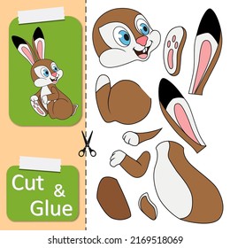 Cut and glue the paper sitting and smiling Hare. Create application the cartoon Rabbit. Education riddle entertainment or amusement for child. Logic game and activities jigsaw. Worksheet activity.