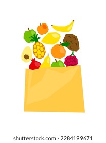 Cut out fruits in paper package isolated on white background. Eco frienly products in grocery bag. Diet and healthy food concept.