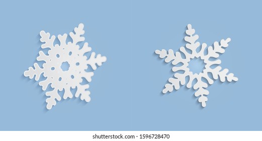 Cut out snowflakes silhouettes with soft shadows. White and blue xmas vector illustrations collection. Winter holidays, New year and Christmas decorations. Trendy modern paper elements for your design