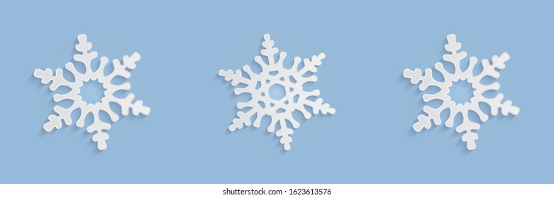 Cut out snowflakes silhouettes with soft shadows. White and blue xmas vector illustrations collection. Winter holidays, New year and Christmas decorations. Trendy modern paper elements for your design