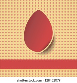 Cut paper egg on polka dot background