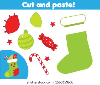 Cut and paste children educational game. Paper cutting activity. Make Christmas stocking with glue and scissors. DIY worksheet