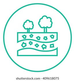 Cut of soil with different layers and trees on top line icon.