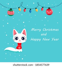 cut white kitten on a background of snow with christmas and new year greetings