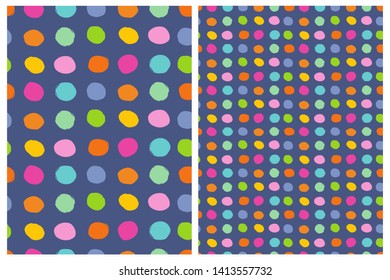 Cute Abstract Geometric Seamless Vector Patterns Set. Irregular Hand Drawn Polka Dots Repeatable Design. Colorful Dots on a Dark Blue Background. Simple Dotted Vector Layouts.
