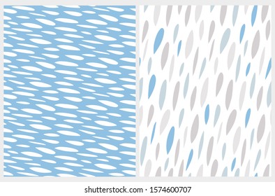 Cute Abstract Geometric Seamless Vector Patterns. White Spots on a Blue Background.Abstract Brushed Raindrops on a White.Irregular Hand Drawn Geometric Vector Print for Fabric,Textile, Wrapping Paper.