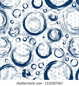 Cute abstract seamless pattern. Large and small circles on a white background. Geometries pattern for fabric. Textile background, vector.