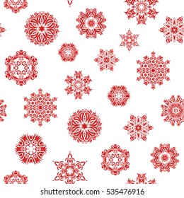Cute abstract seamless snowflakes vector design on white background. Flat snow doodle icons, snow flakes silhouette in red colors for christmas banner, cards. New year snowflake.