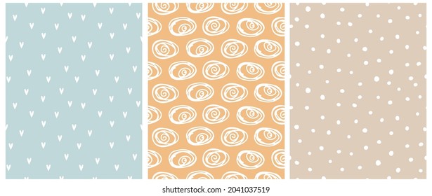 Cute Abstract Seamless Vector Patterns with White Irregular Brush Swirls,Dots and Hearts Isolated on a Light Yellow, Pastel Blue and Beige Background. Infantile Style Geometric Doodle Print.