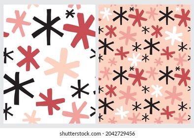 Cute Abstract Seamless Vector Patterns with Red, Pink and Black Irregular Brush Stars Isolated on a White and Blush Pink Background. Infantile Style Geometric Print. Abstract Starry Doodle Pattern.