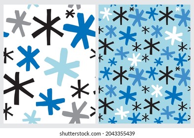 Cute Abstract Seamless Vector Patterns with Blue,Gray and Black Irregular Brush Stars Isolated on a White and Blue Background. Infantile Style Geometric Print. Abstract Starry Doodle Pattern.