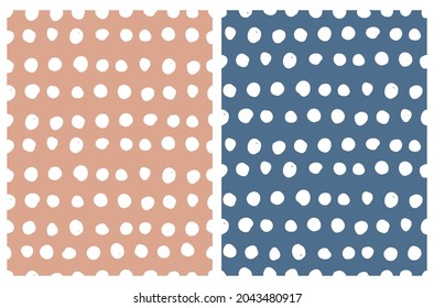 Cute Abstract Seamless Vector Patterns with White Irregular Brush Dots Isolated on a Light Brown and Dark Blue Background. Infantile Style Geometric Print. Abstract Dotted Doodle Pattern.