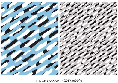 Cute Abstract Spots Seamless Vector Pattern. White and Black Irregular Brush Lines on a Light Blue and Gray Background. Abstract Wild Animal Skin Print ideal for Fabric,Textile, Wrapping Paper, Cover.