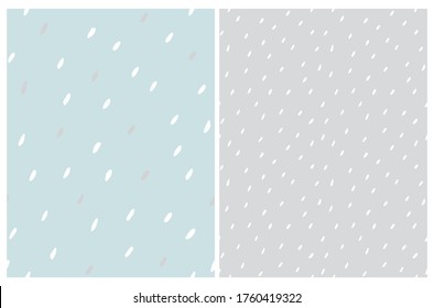 Cute Abstract Spots Seamless Vector Pattern. White Irregular Brush Lines on a Light Gray and Pastel Blue Backgrounds. Lovely Pastel Color Doodle Print. Funny Infantile Style Repeatable Backdrop.
