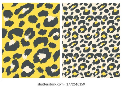 Cute Abstract Wild Animal Skin Vector Pattern. Black Brush Irregular Spots Isolated on a Cream and Yellow Backgrounds. Leopard Skin Vector Print. Simple Wild Cat Fur Backdrop.