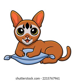 Cute abyssinian cat cartoon on the pillow