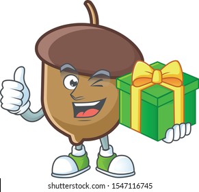 cute acorn with character mascot design holding gift
