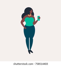 Cute african american girl with smartphone. Plus size model. Dark skin woman. Fashion