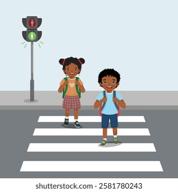 Cute African kids students with backpack walking crossing road near pedestrian traffic light on zebra cross way to school