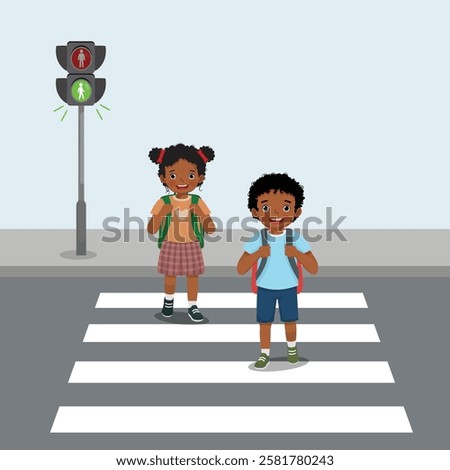 Cute African kids students with backpack walking crossing road near pedestrian traffic light on zebra cross way to school