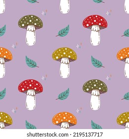 Cute amanita vector seamless pattern. Funny autumn print with hand drawn doodle colorful toxic mushrooms. Design for textile or wrapping paper