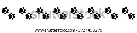 Cute animal. Foot dog seamless pattern. Footprint graphic. Pet outline. Repeated pattern trail cat. Paw prints for design service print. Foots border isolated on white background. Shape paw. Vector